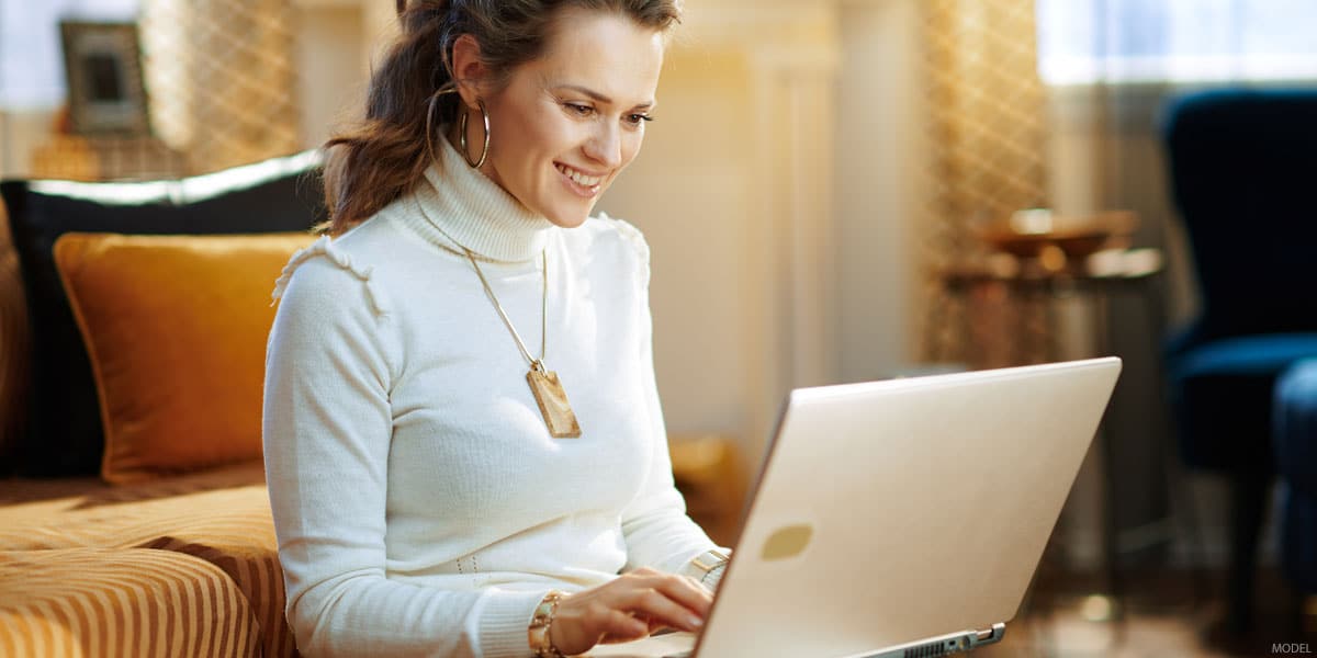 Woman using her laptop