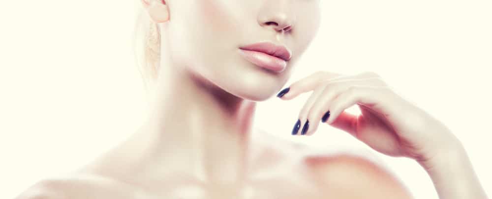 Woman almost touching chin