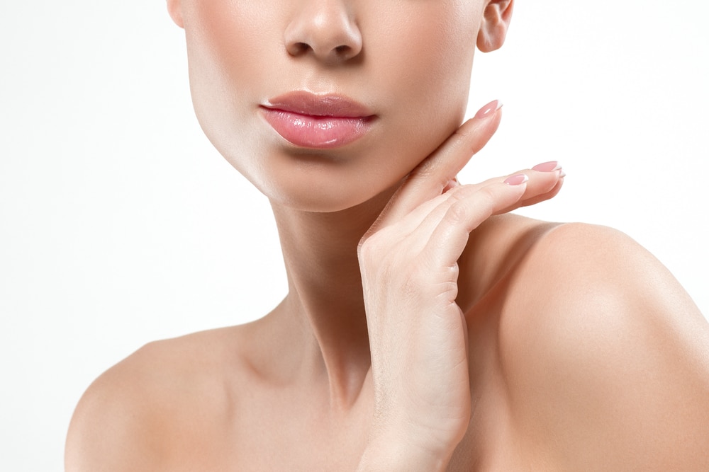 Woman's lower face shows a proportional chin that extends in harmony with her nose