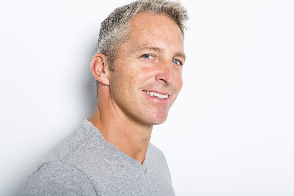 Silver-haired man looks handsome with some mild cosmetic touchups.