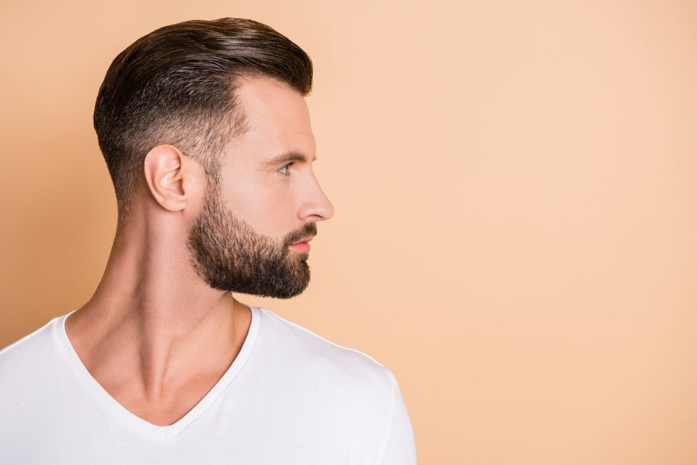 Man's face in profile shows a balanced nose and chin.